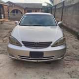 A picture of Toyota Camry 04 Nigeria used first body pan everything is