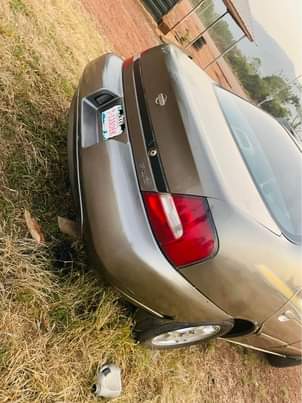 A picture of Nissan in perfect condition engine and gear is Only AC