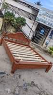A picture of Nauza kitanda 5 6 mbao ngum Bei 125 nipgie 0689319654