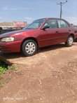 A picture of Clean Nigerian Used Toyota Corolla First Body Super clean Fabric