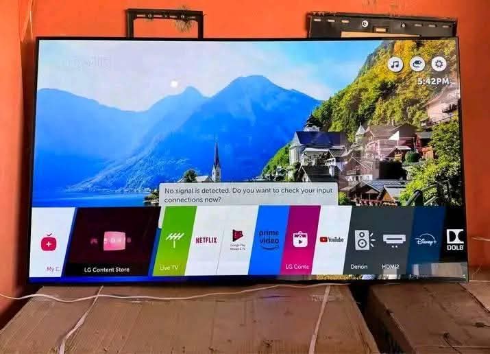A picture of 65inch LG frameless smart TV brand new 4k with WiFi