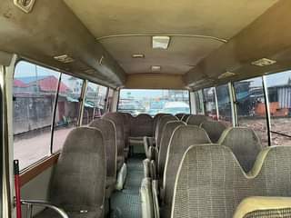 A picture of Neatly used Toyota coaster bus 2008 model flash on first