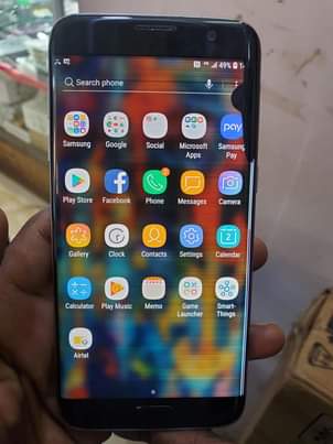 A picture of SAMSUNG GALAXY S7 EDGE. AT 155000.