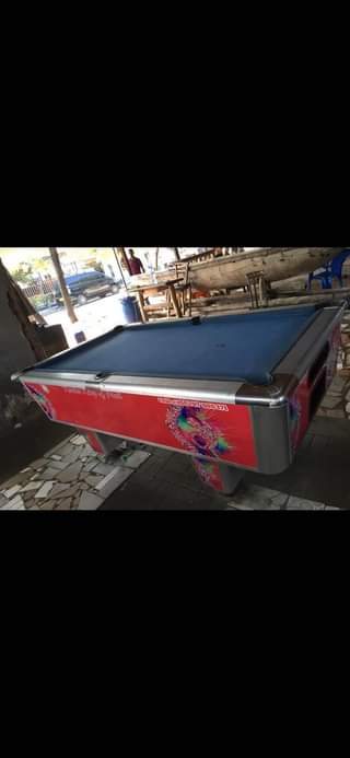 A picture of Pooltable Kama linavyoonekana kazi imenyooka sana na kitambaa nakuwekea kipya