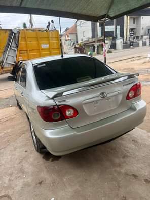 A picture of Corolla 04 everything working fine including AC Going for 3m