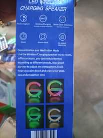 A picture of Led wireless charging Bluetooth speaker