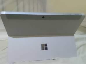 A picture of Microsoft surface pro with slight invisible crack has 4gbram 64gb