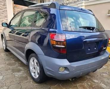 A picture of 2004 model PONTIAC VIBE for urgent sales Extremely Clean Black
