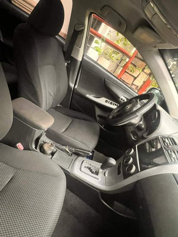 A picture of 2012 TOYOTA COROLLA EXTREMELY BELGIUM GRADE Everything Pristine ORIGINAL DOCUMENT