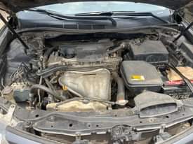 A picture of An Extremely Clean 2014 Camry with untempered engine and gear