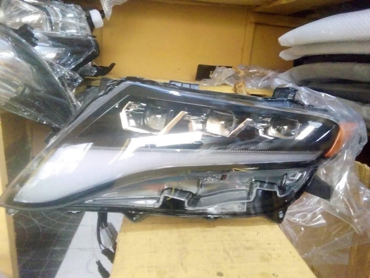 A picture of Toyota spare parts upgrading Head lamp rear light Vanza Camry