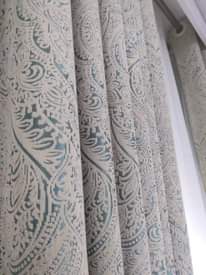 A picture of Curtains and rods