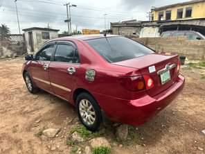 A picture of Toyota Corolla Four plugs Ac chilling Engine and gear transmission