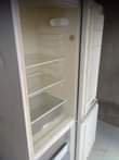 A picture of HP laptop Fridge and home theater
