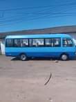 A picture of TOYOTA COASTER MAYAI YA KAZI BADO NZIMA SANA BEI POA