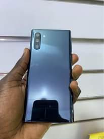 A picture of Samsung Note 10 5G 256gb storage 430k slightly cracked WhatsApp