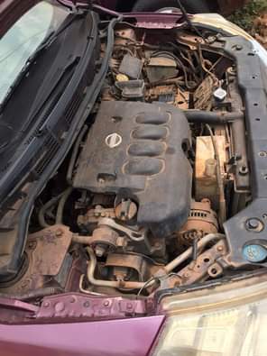 A picture of  STILL AVAILABLE. Clean Nigerian Used Nissan Tiida Fabric interior.