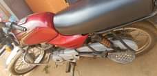 A picture of Bajaj for sale is good for bussines money needed urgently