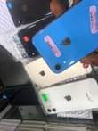 A picture of phones pc original iwatch and airpod power bank