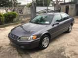 A picture of TOYOYA CAMRY LE 2000 FOR SALE 2349035015509 4plug engine automatic