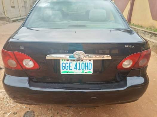 A picture of Toyota Corolla 2004 Color Black Neat interior Engine 100 fine