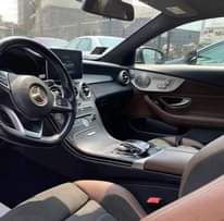 A picture of REGISTERED 2016 MERCEDES BENZ C300 COUPE Grey on Brown Interior