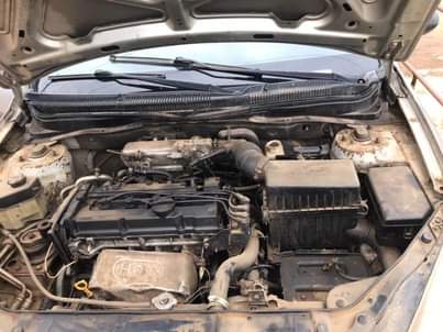 A picture of Hyundai accent complete first body engine gear perfect. Ac not