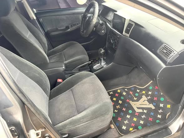 A picture of Toyota corola 2005 model sport edition engine and gear is