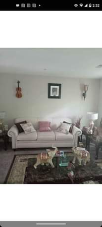 A picture of Beautiful loveseat and sofa set and dining room table four