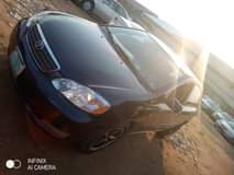 A picture of Good grade black Corolla Ac intact Gear intact Engine intact