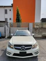 A picture of Registered white C300 2009 model Buy and drive Full option