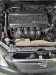A picture of Toyota Corolla 2004 Engine Gear and AC in good Condition