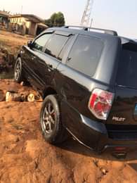A picture of Clean Nigerian Used Black Honda Pilot Repainted on first body