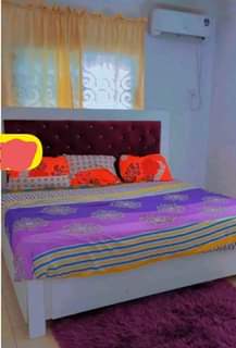 A picture of 7ft by 7ft bed frame and mattrass