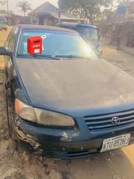 A picture of Toyota Camry tiny light Engine ok Gear ok Body needs
