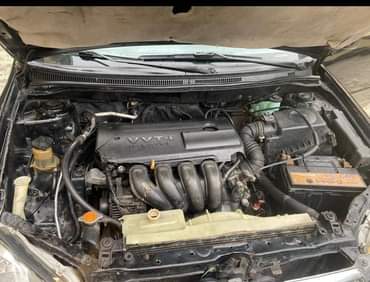 A picture of Sharp buy and drive 2004 Toyota Corolla with nothing to