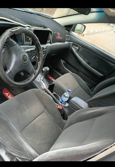 A picture of AWOOF DEALERS DEAL TOYOTA COROLLA 04