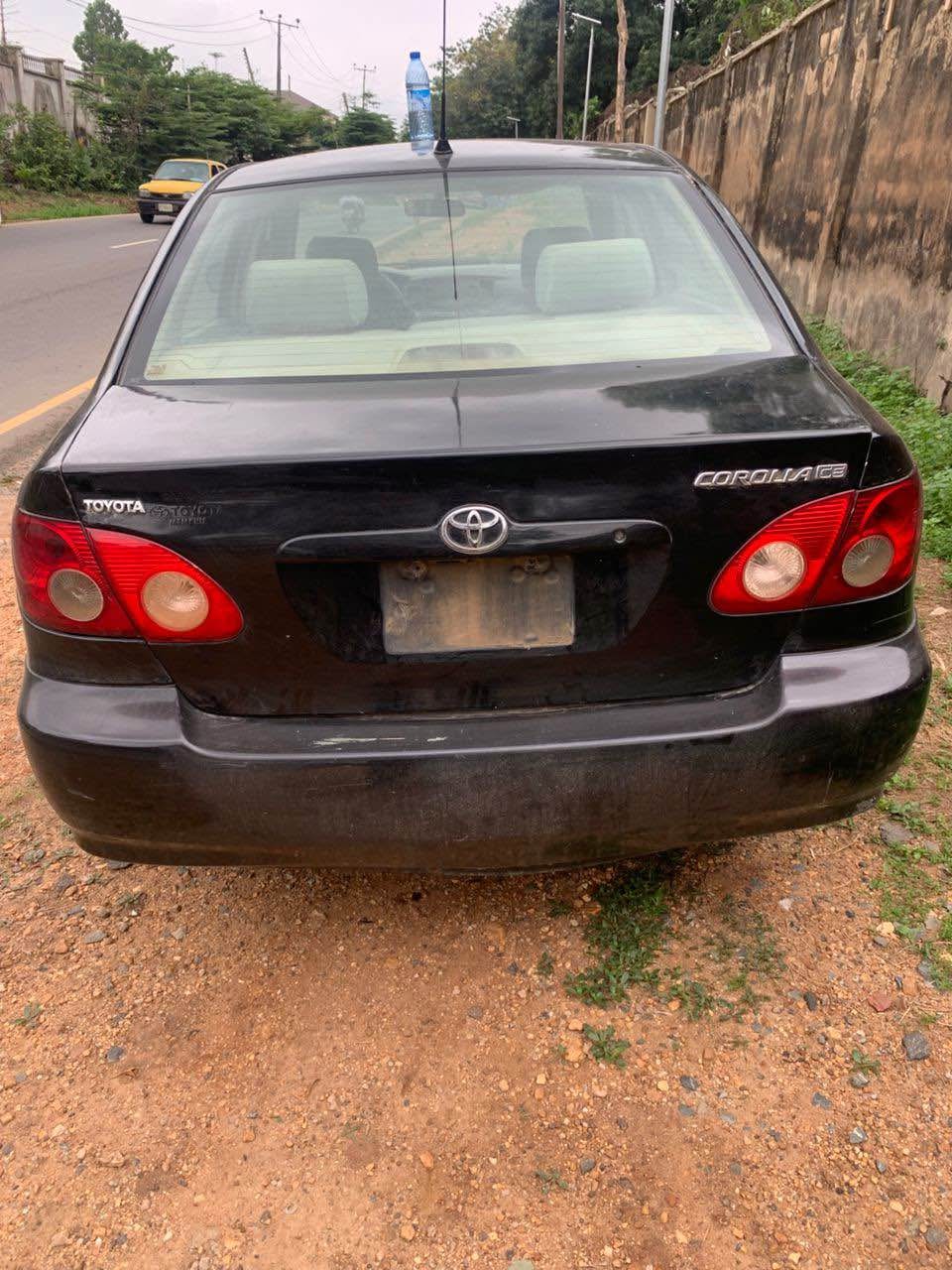 A picture of Toyota Corolla 2003 partly only the bumber is rough Ac