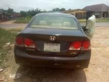 A picture of Honda civic is available with good condition engine and gear