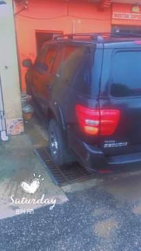 A picture of Perfectly working sequoia SUV 2006 black color. Leather seats with