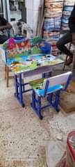 A picture of Kids reading tables