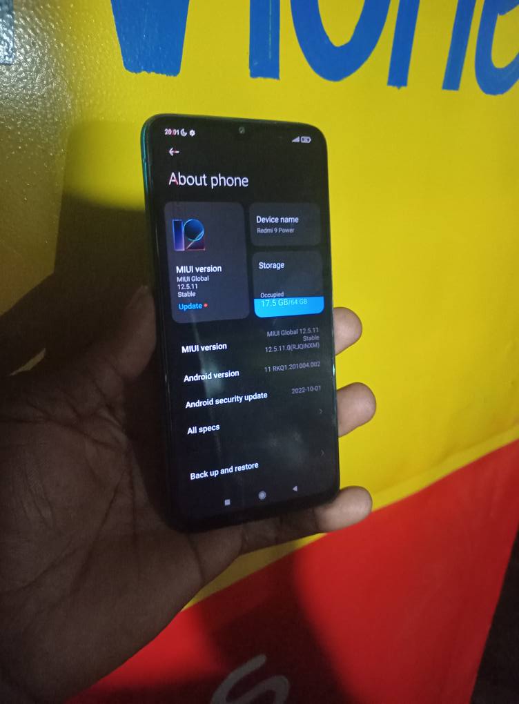A picture of Redmi 9power 64gb 4gbram 6000Mah battery.has dent in the screen