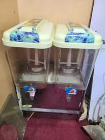 A picture of Ac and juice dispenser