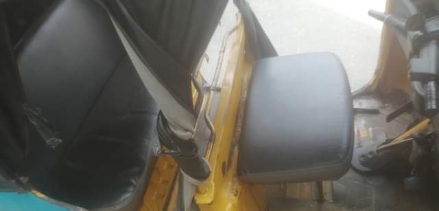 A picture of Tvs tricycle