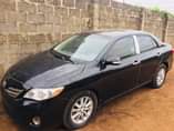 A picture of Neatly painted on first body Corolla 012 buy and drive