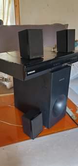 A picture of Samsung Hometheater and tv 32 inches digital hisense for sell