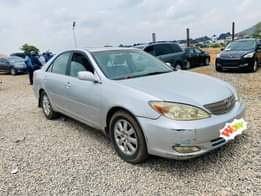 A picture of DISTRESS DISTRESS 2004 model of Camry big for nothing with