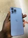 A picture of Original IPhone 13 pro max 256 gab storage 1 wk