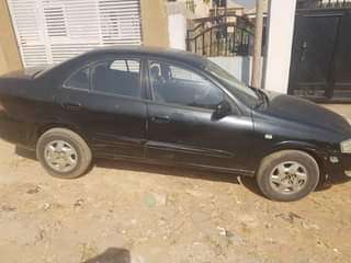 A picture of Nissan sunny 2010 do car is good engine and gear