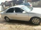 A picture of Toyota Camry 2003 LE First Body Bumper Painted 4 Plugs